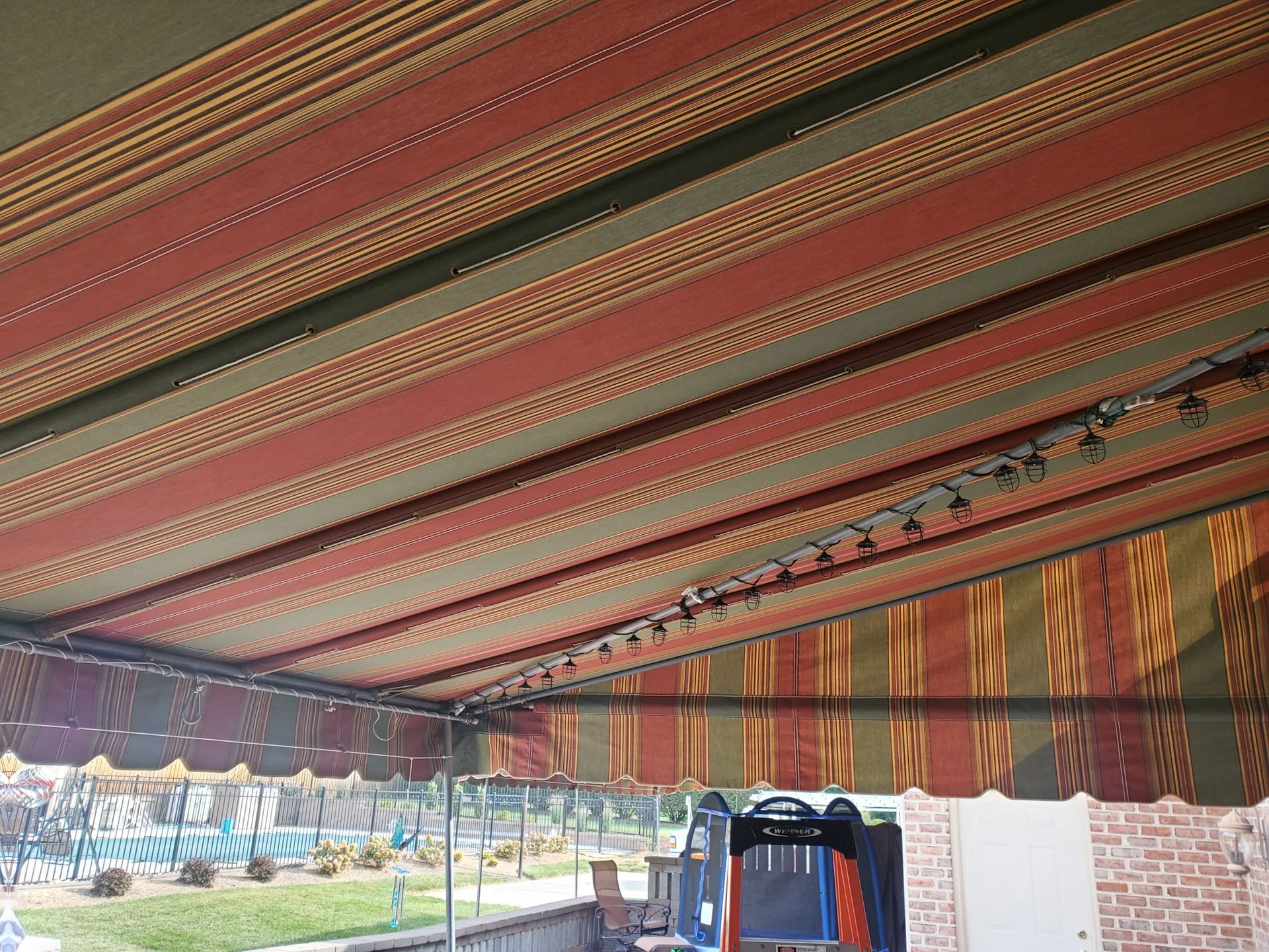 maroon and green stationary patio cover inner view
