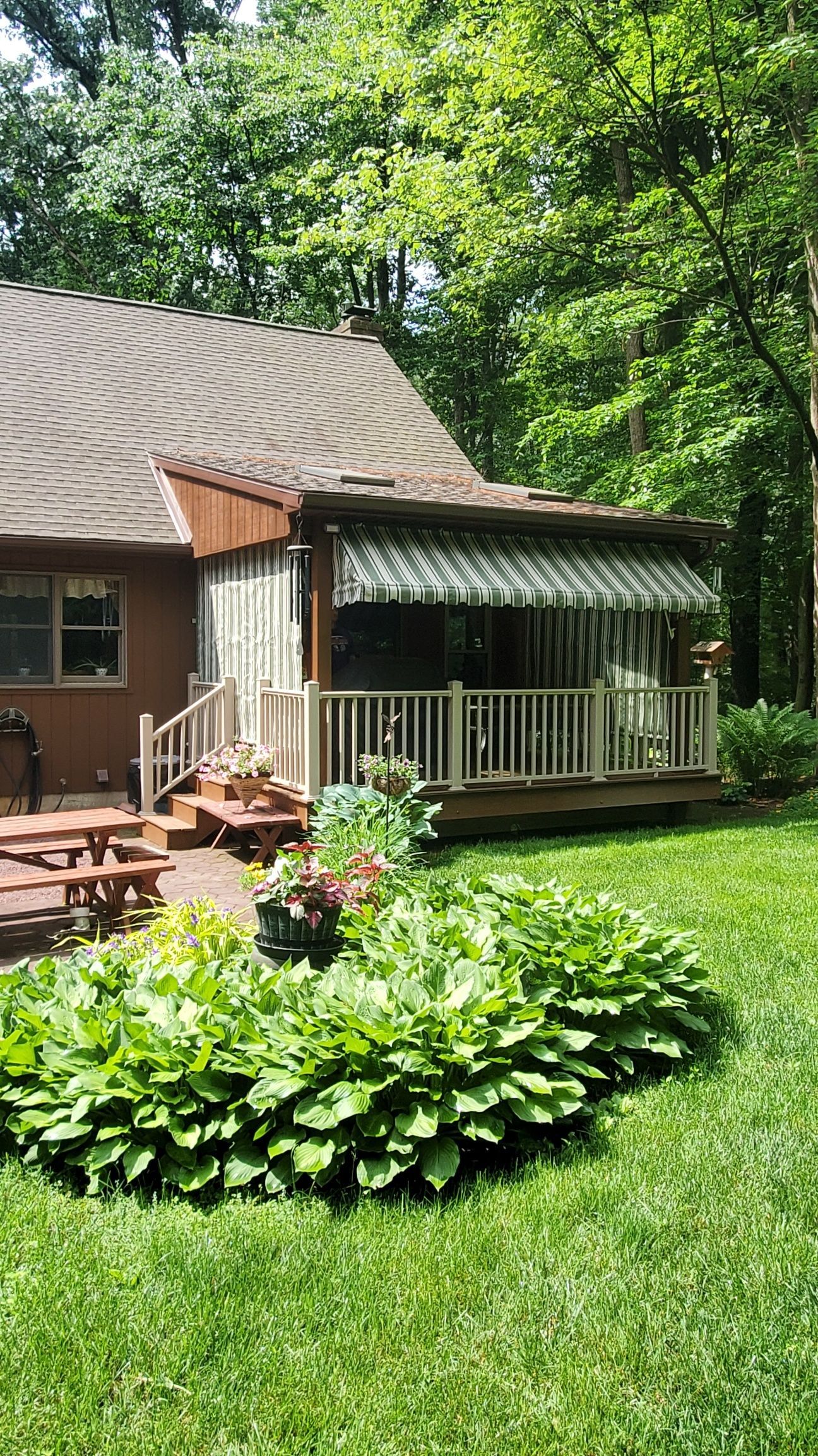 green roll up patio enclosure