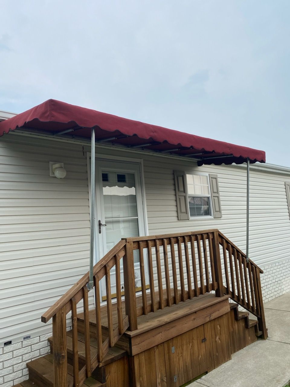 small maroon stationary doorway cover