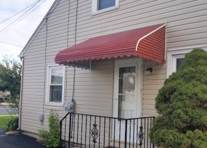red residential awning