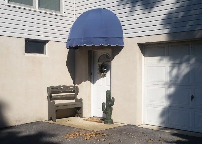 blue dome shape commercial awning