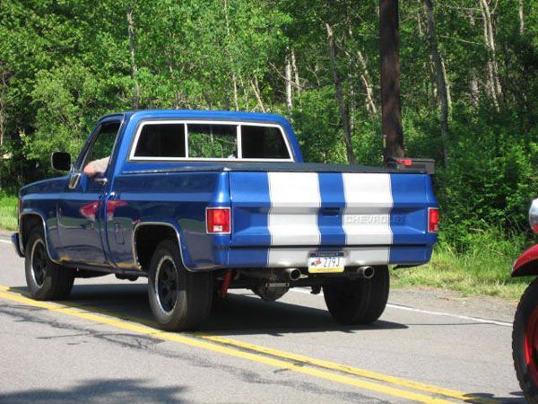 Blue truck with white stripes