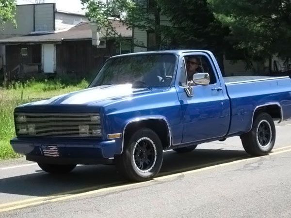 Blue truck with white stripes