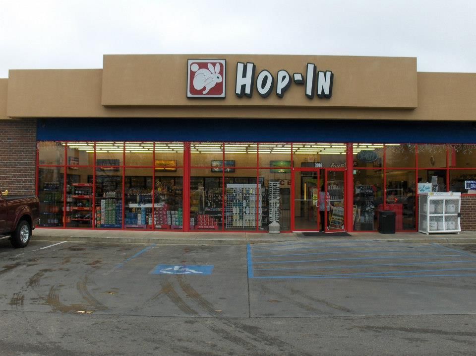 A hop-in store with a handicapped parking spot