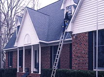 Man cleaning window