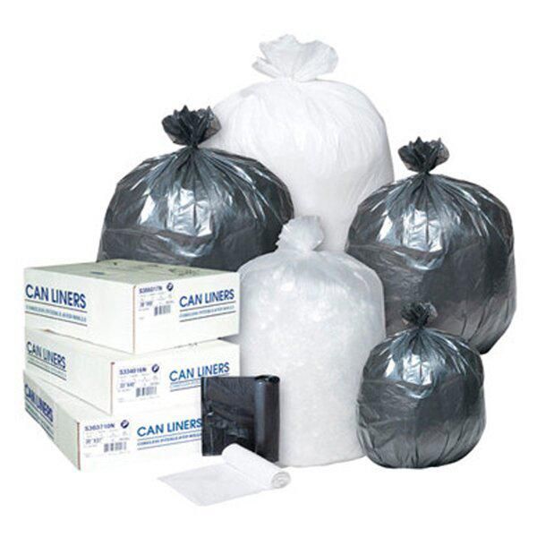 Boxes of can liners are stacked on top of each other.