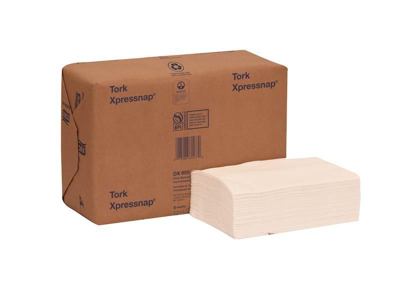 A box of paper towels next to a stack of paper towels.