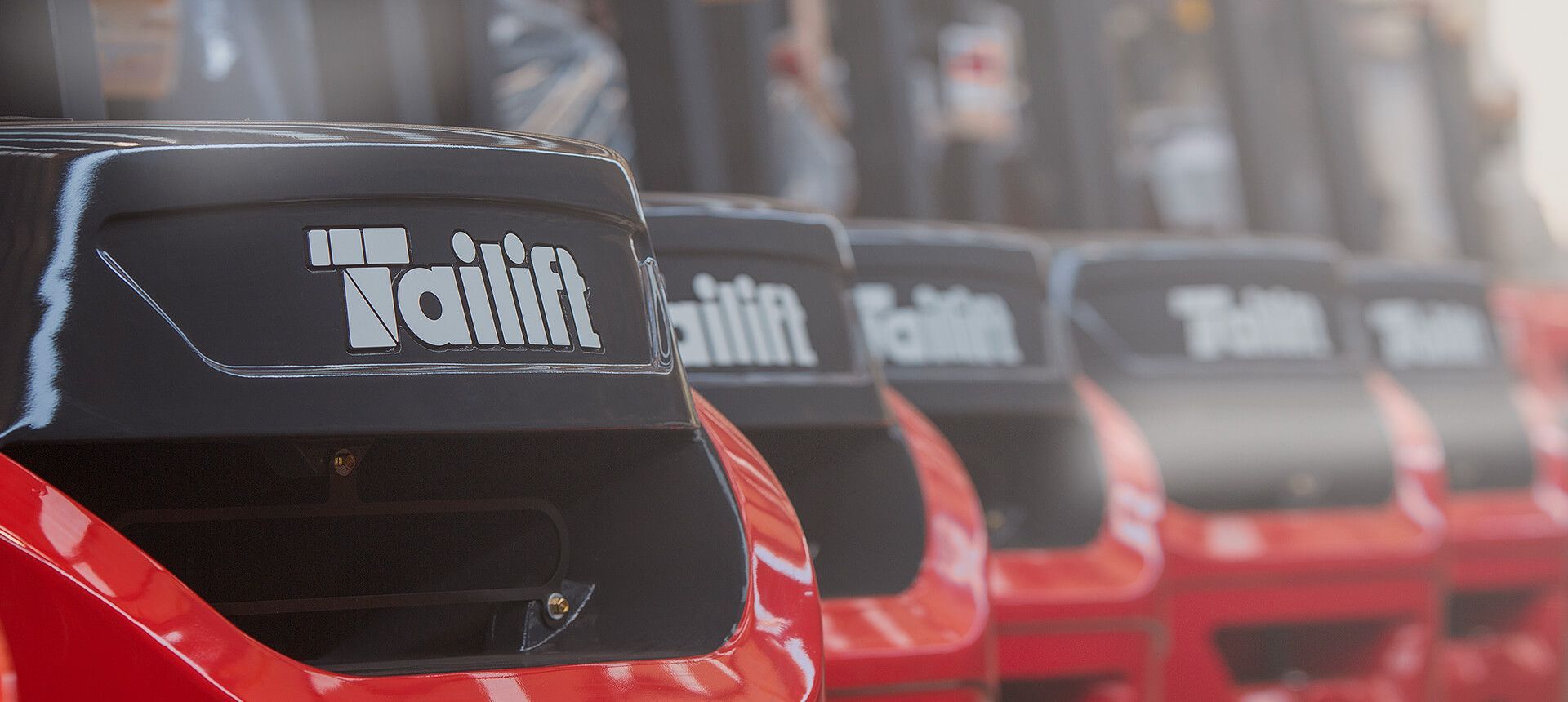 Red and black roller coaster cars with the words