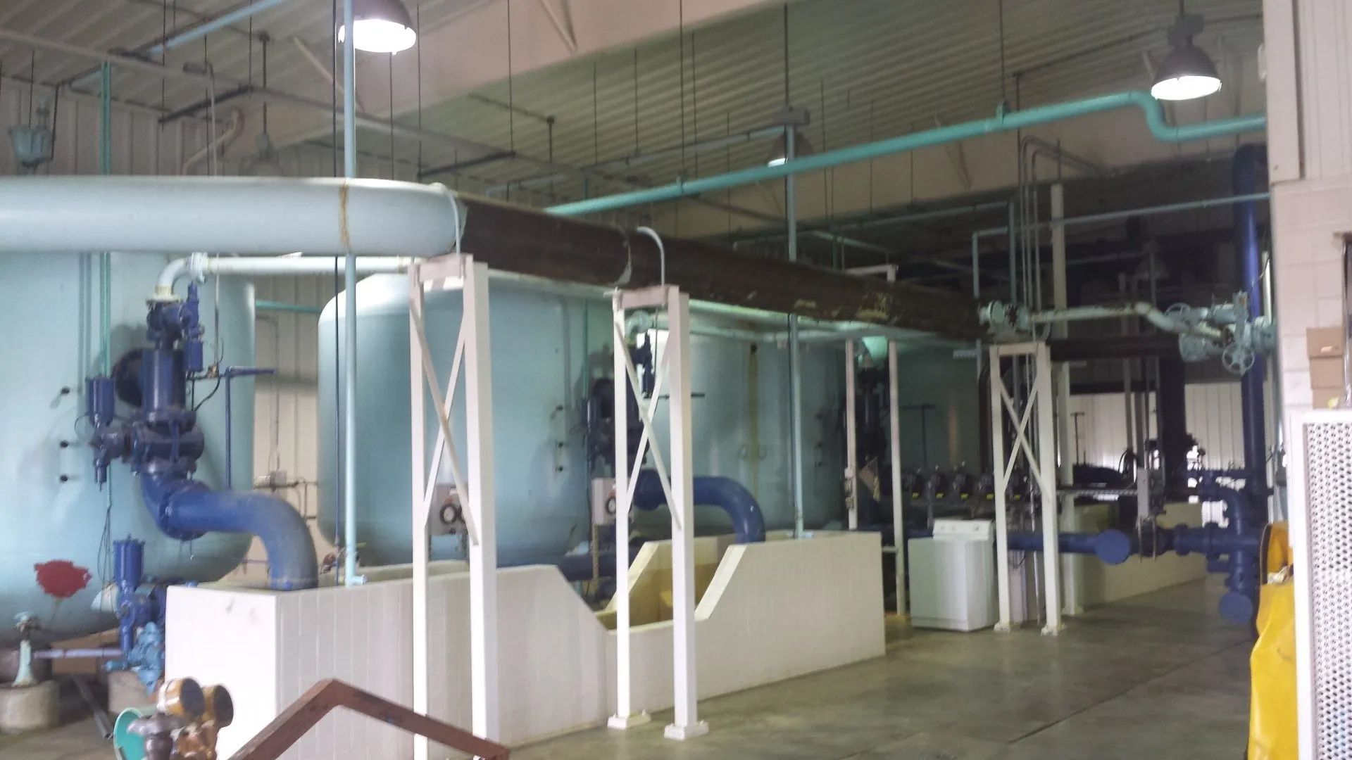 A large room with a lot of pipes in it