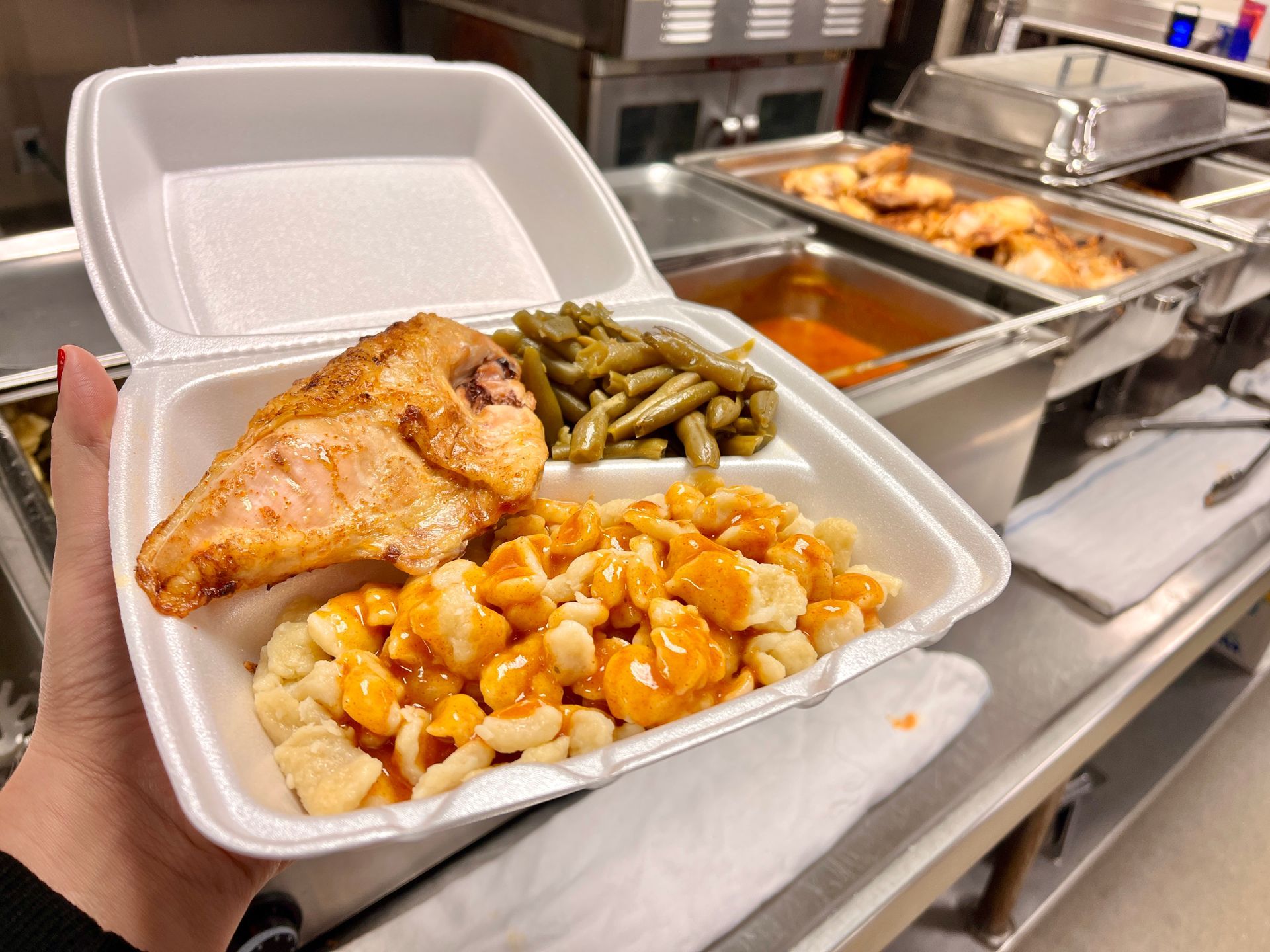 Chicken Paprikas with traditional Spaetzle Noodles and and lightly buttered green beans to-go.