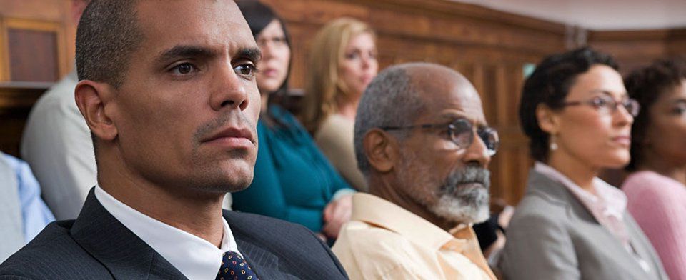 A group of people in a courtroom
