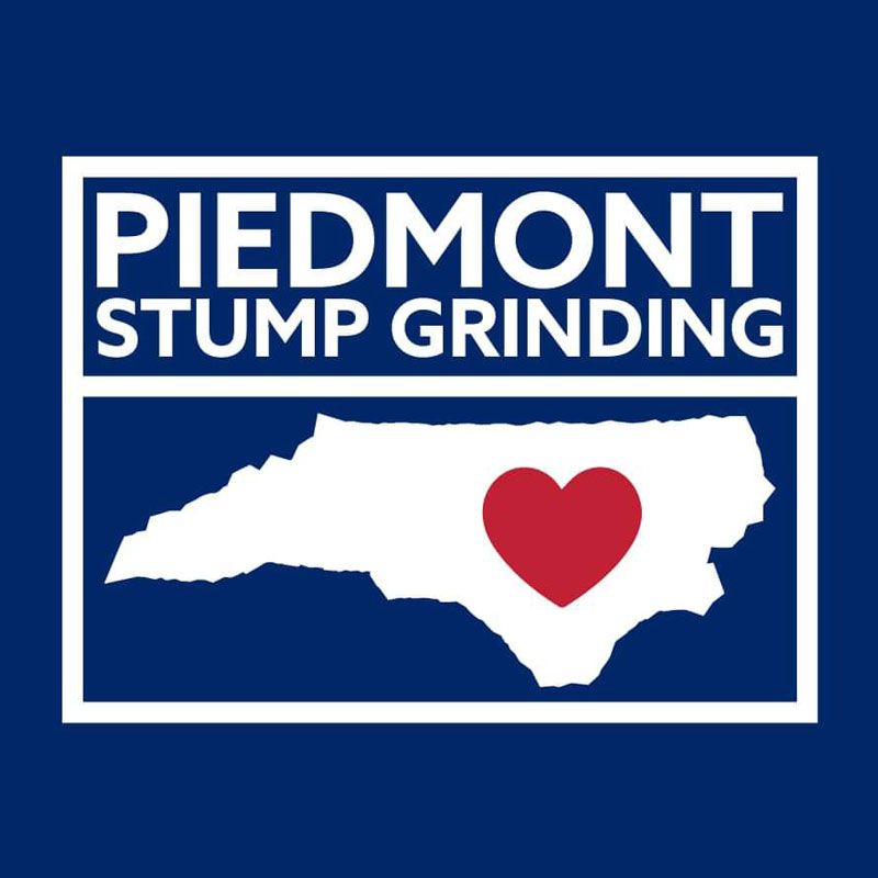 Piedmont Stump Grinding logo with white text on a blue background; features a white outline of North Carolina with a red heart.