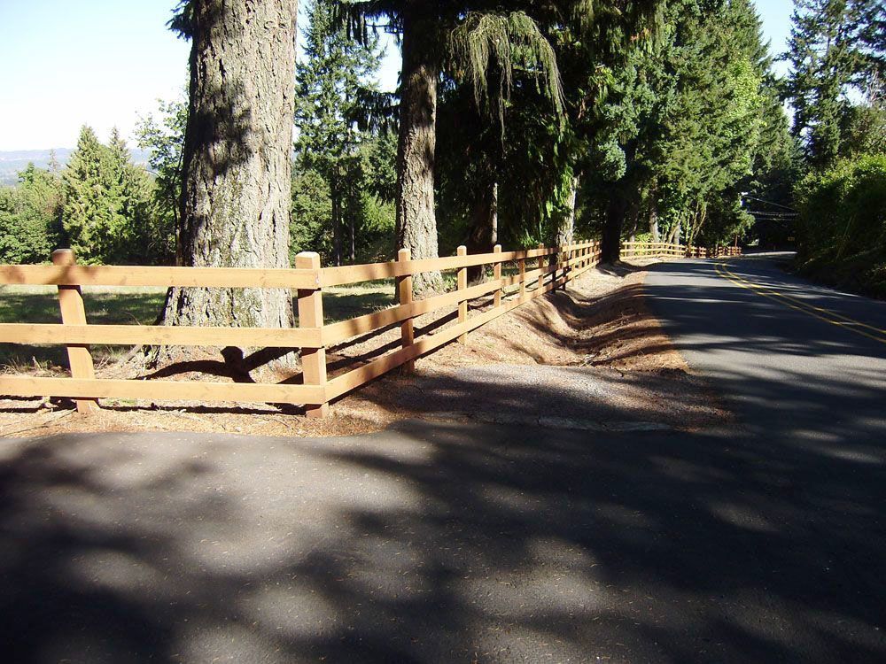 A fence along the side of a road