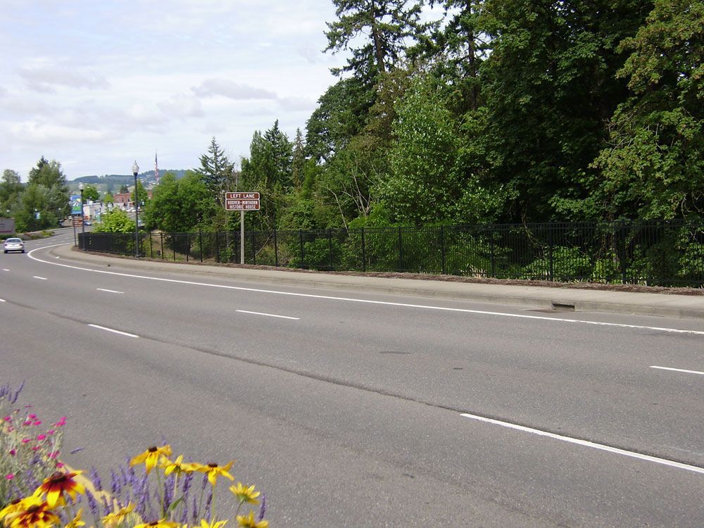 A sign on the side of a road says welcome