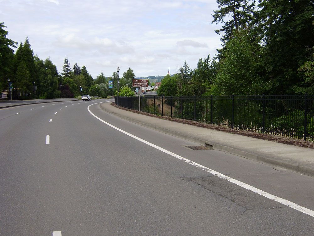 A road with a white line on the side of it