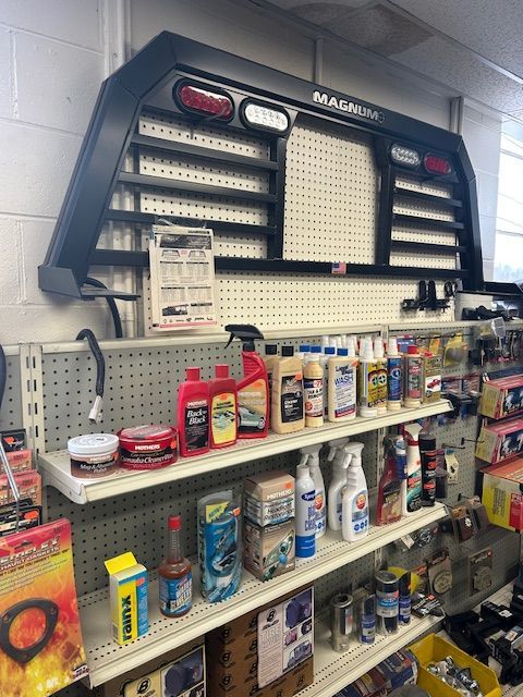 A store shelf filled with lots of cleaning products