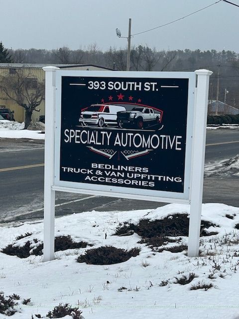 A sign that says specialty automotive on it