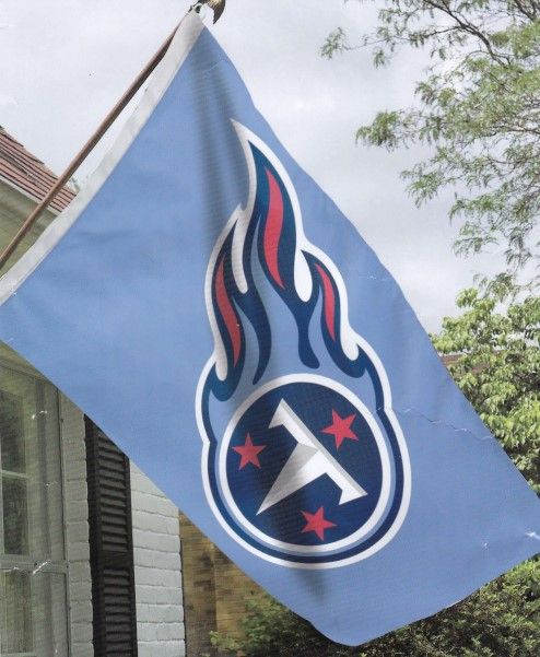 A blue flag with a flame and the letter t on it