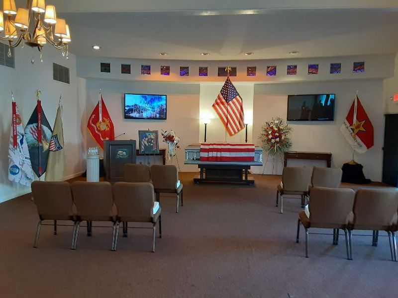 There is a coffin in the middle of the room.