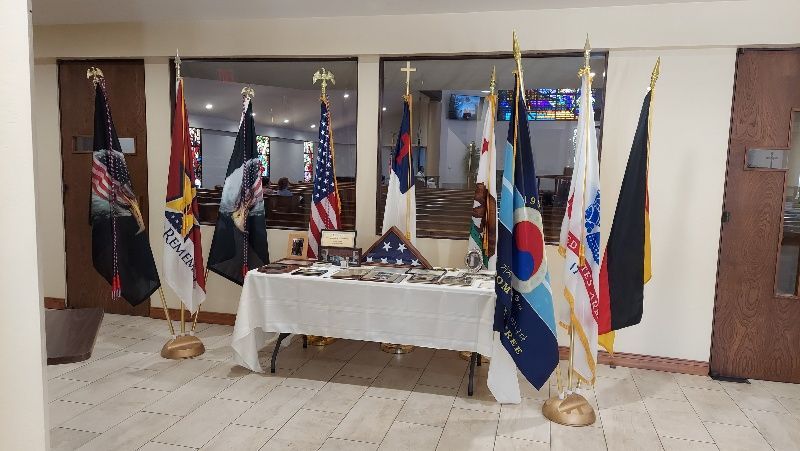 A table with flags on it in a room