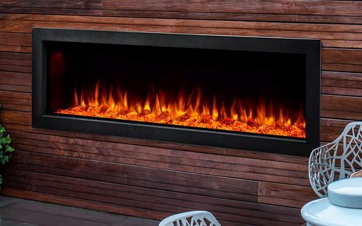 Electric fireplace set in a wooden wall; flames flicker with orange and yellow hues.