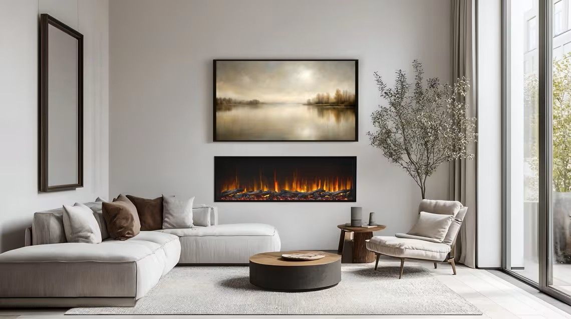 Living room with white walls, fireplace, art, and modern furniture.