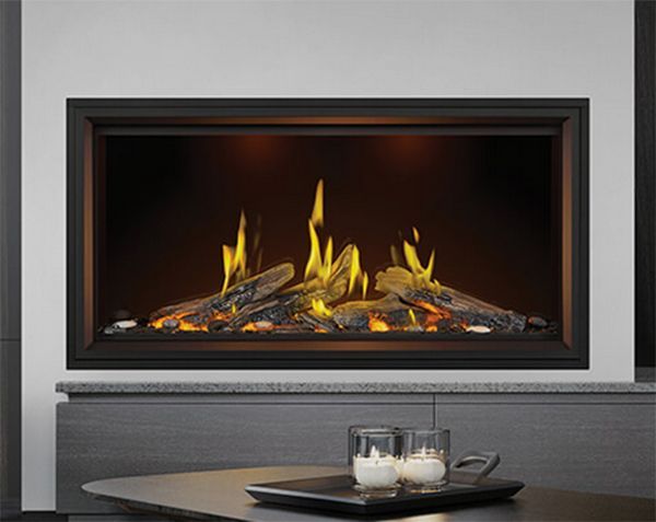 Electric fireplace with glowing flames and dark wood logs.