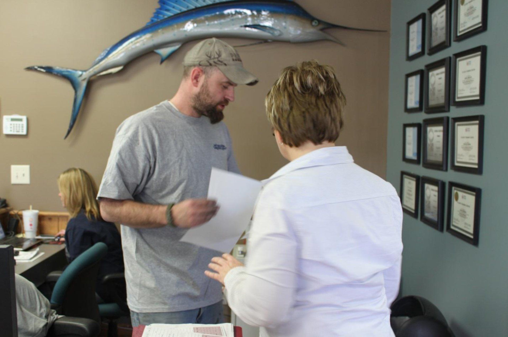 Man talking to a customer