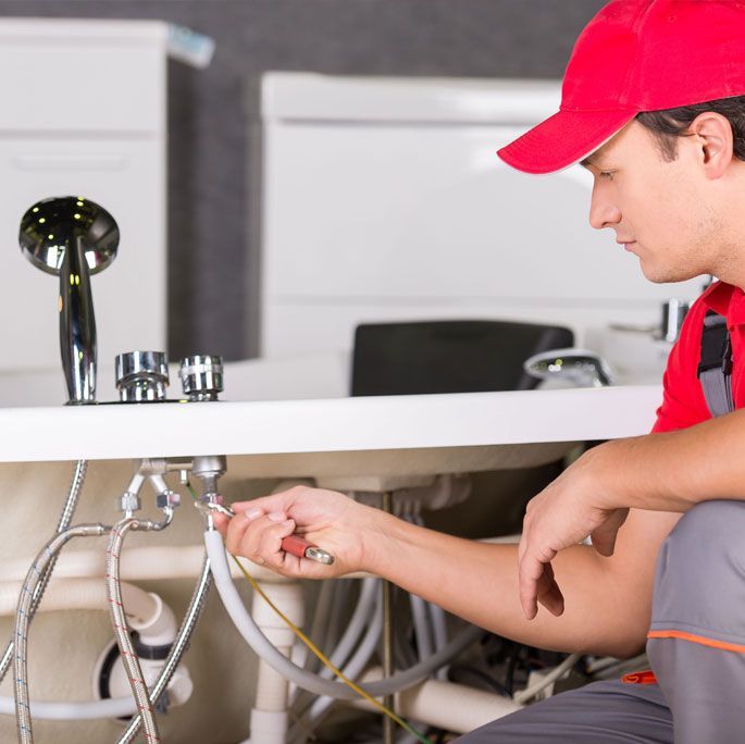 Learn More About Plumbing Plumber Fixing Tap