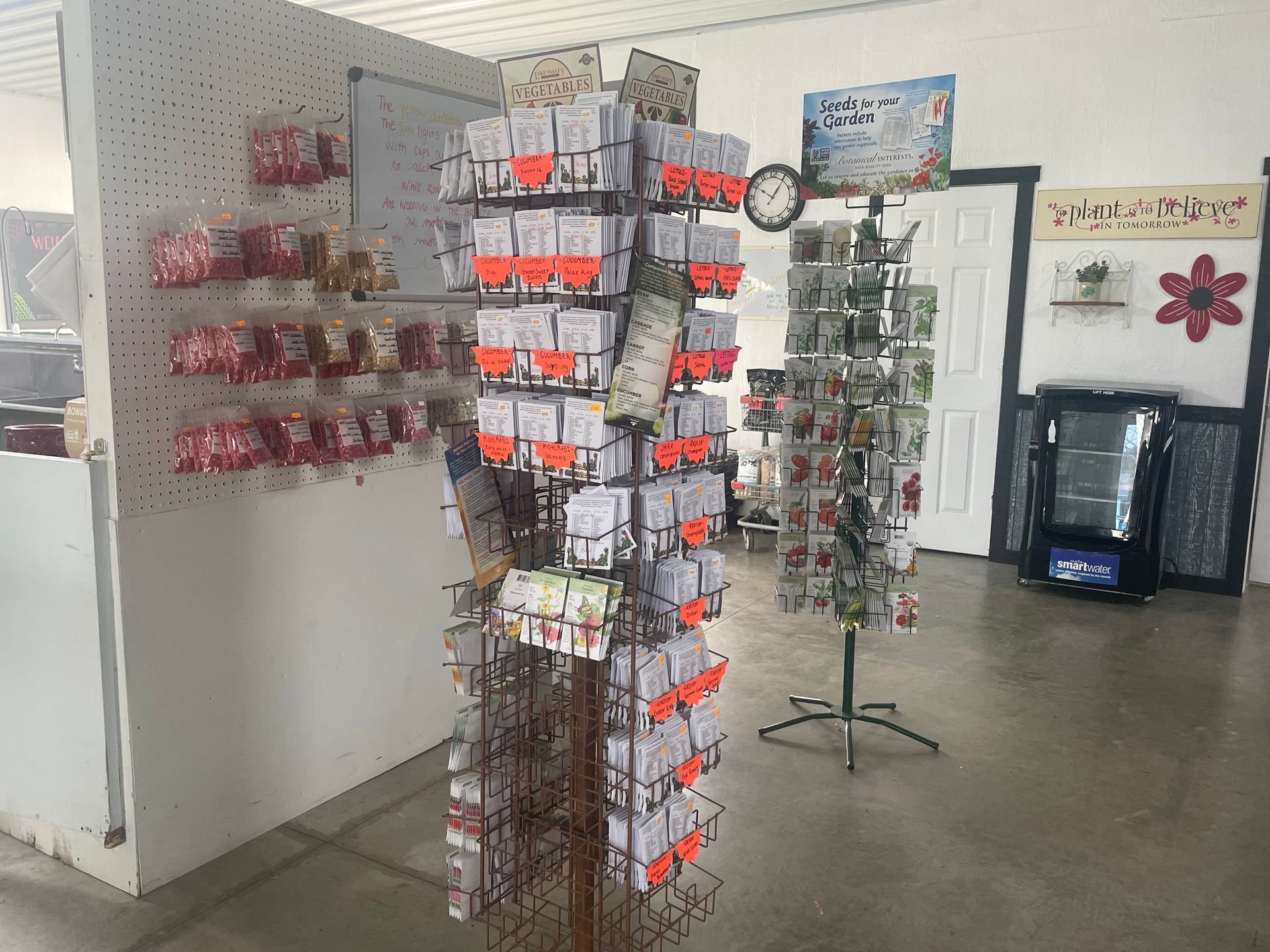 A store with a lot of items on display and a clock on the wall.