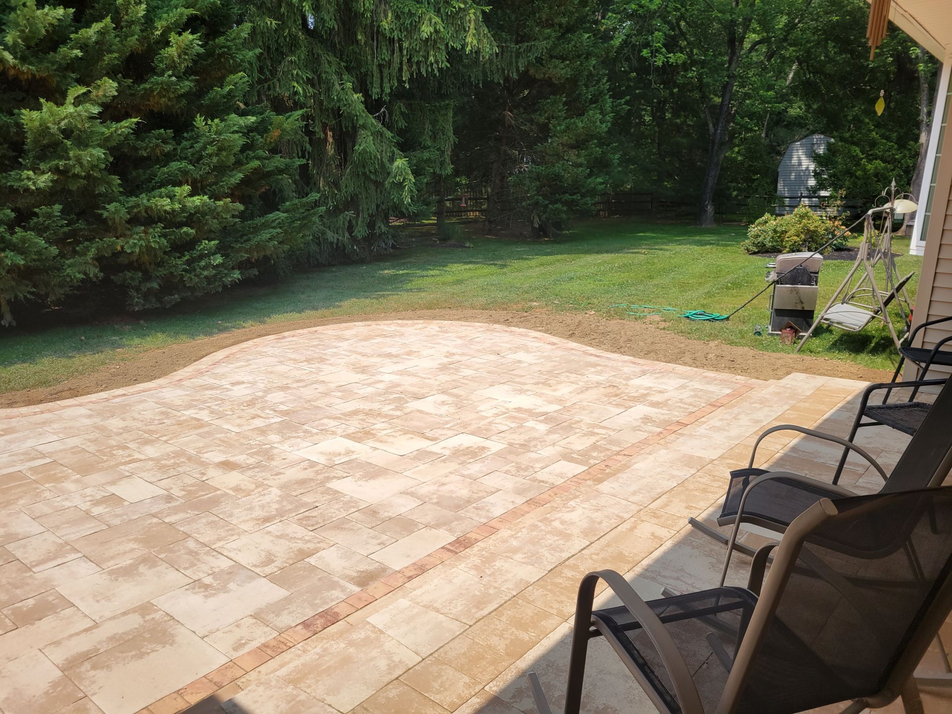 travertine stone patio with double border top view