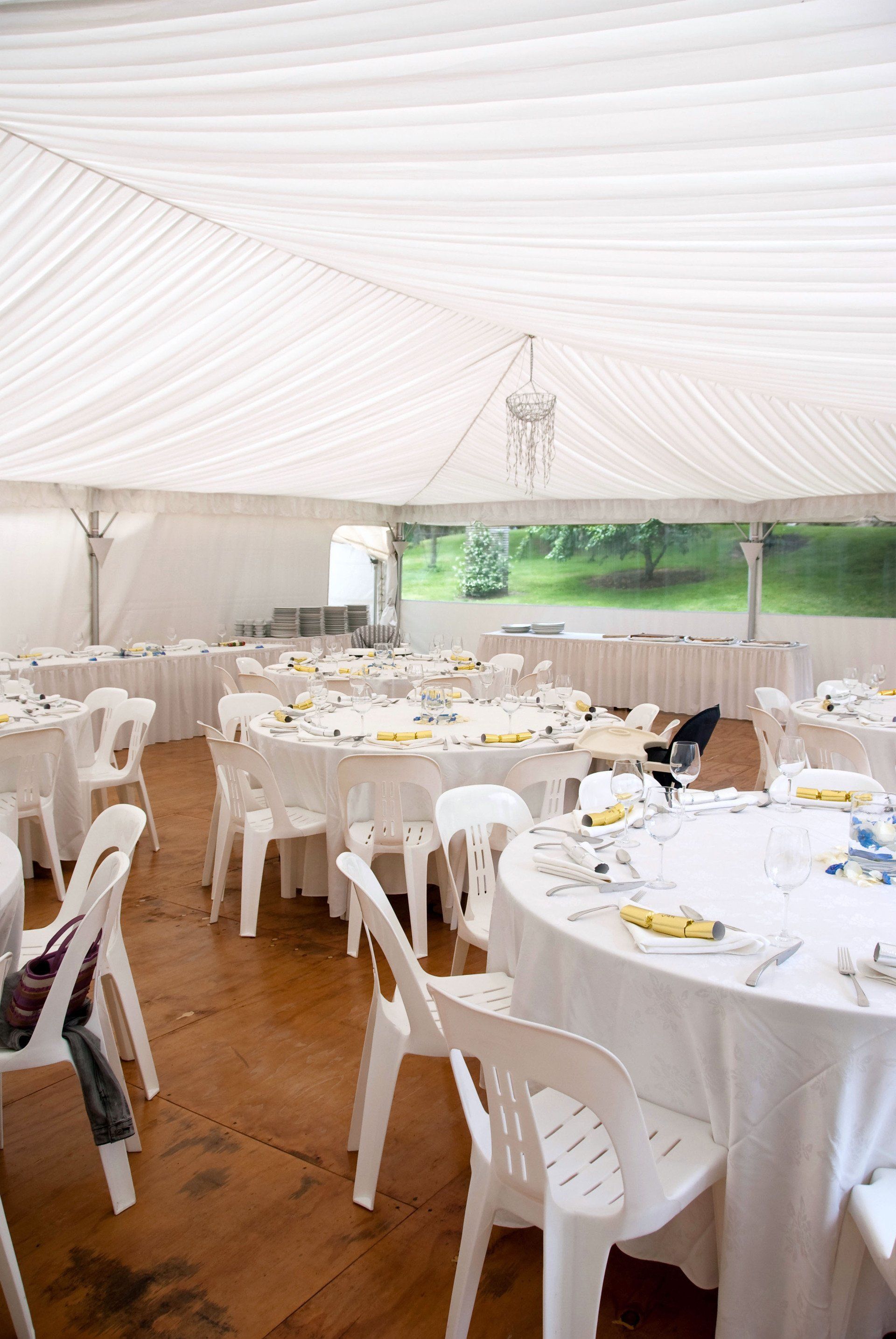 Round tables with white chairs