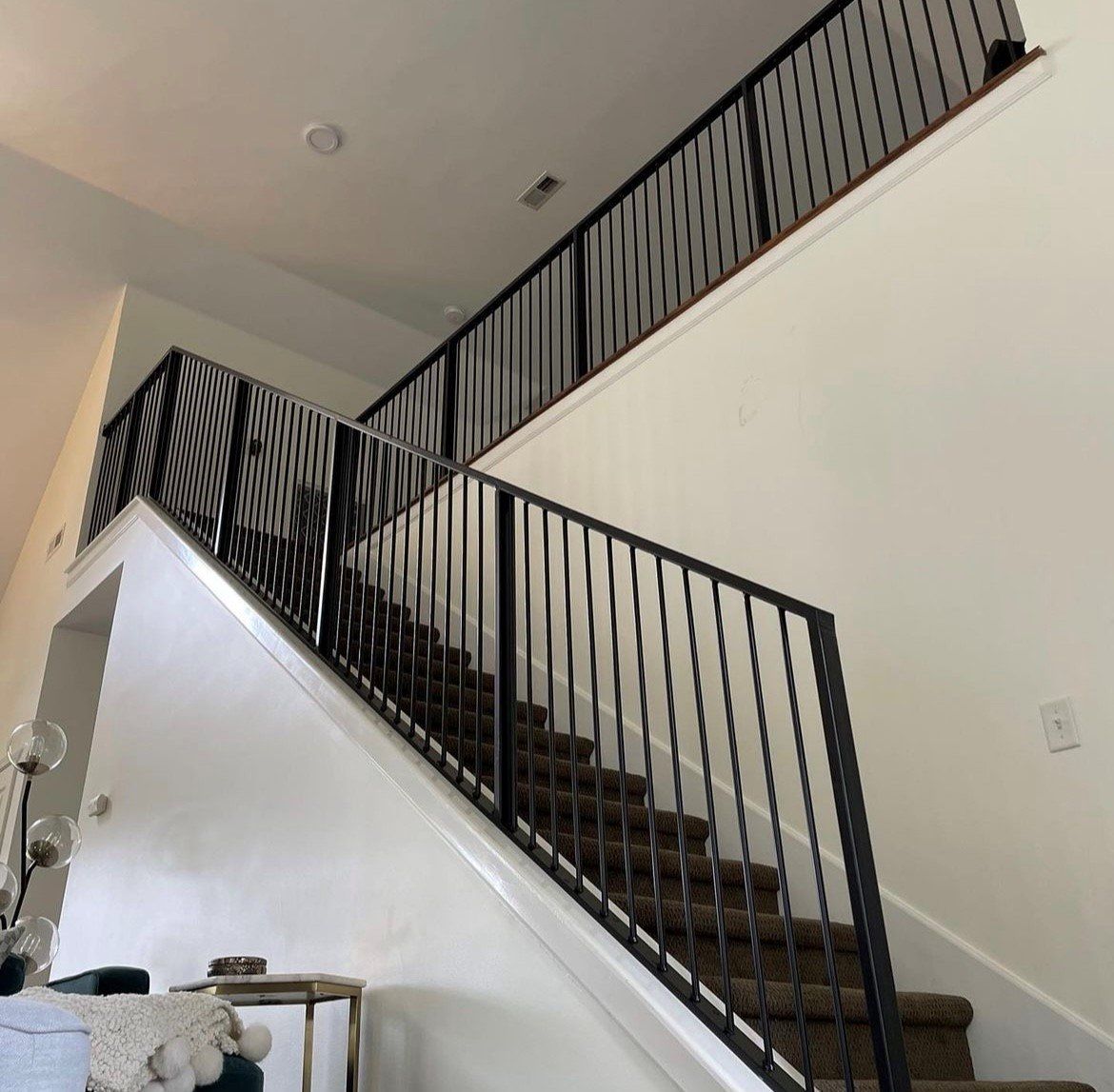 black stairs railings