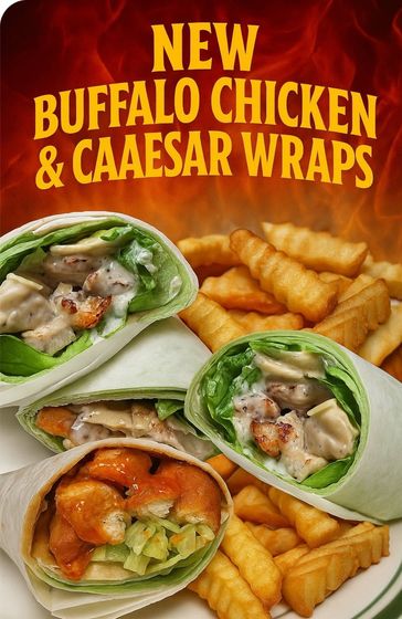 A plate of buffalo chicken and caesar wraps with french fries