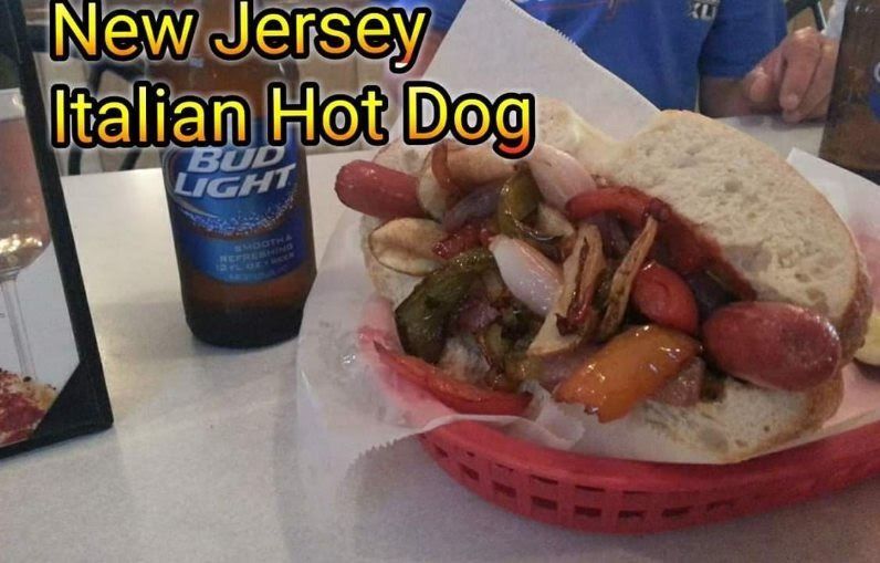 Hot dog sandwich with a bottle of Bud Light