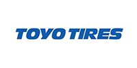 Toyo Tires logo in blue on a white background