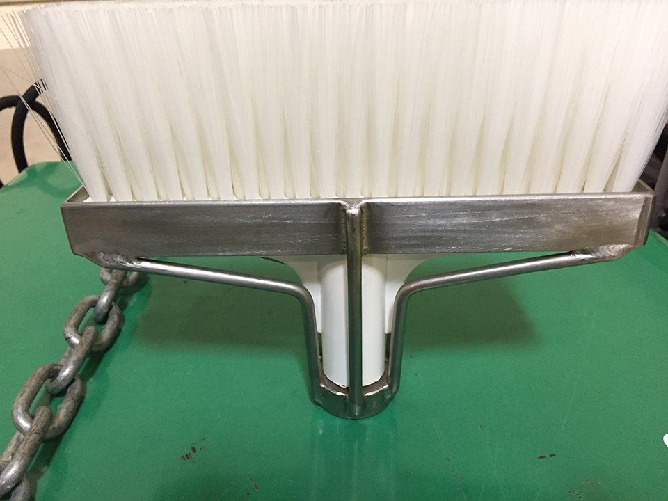 Medical grade brush support