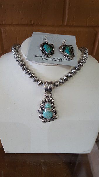 turquoise pendant and earrings