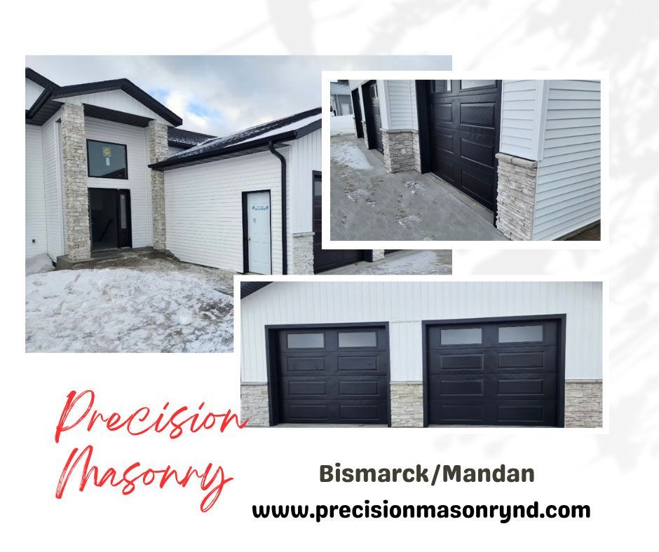 house with white siding and stone accents