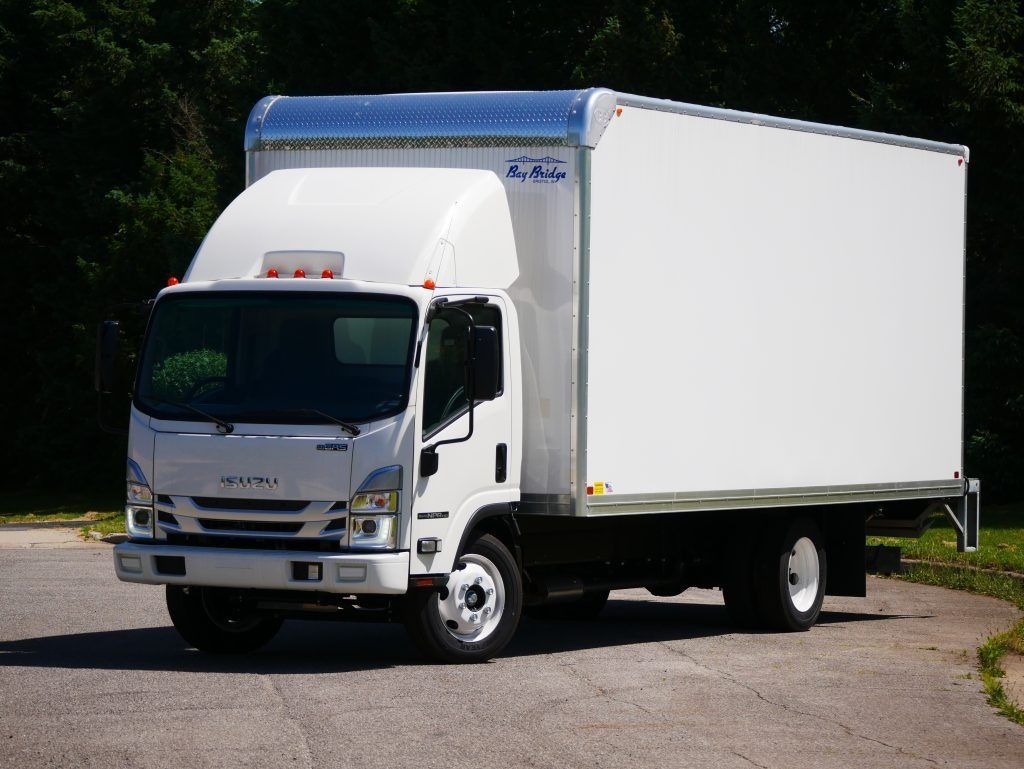 White box truck parked on asphalt.