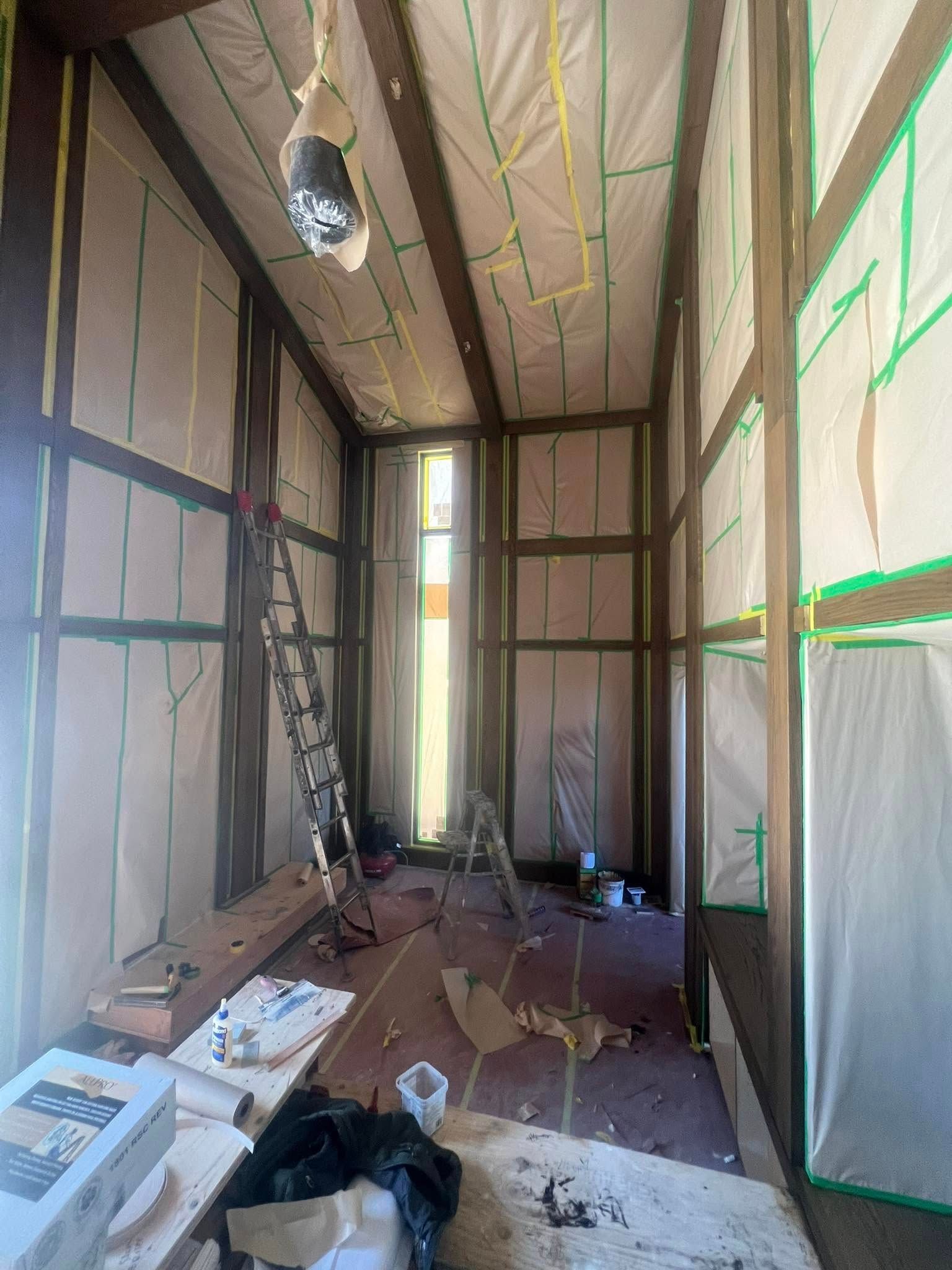 Interior framing with insulation and exposed beams, a work in progress.