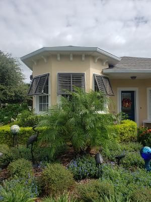 white hurricane shutters