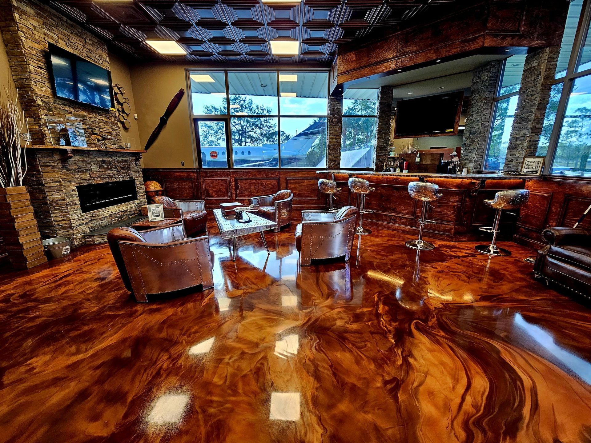 Interior with glossy, brown-toned epoxy floor