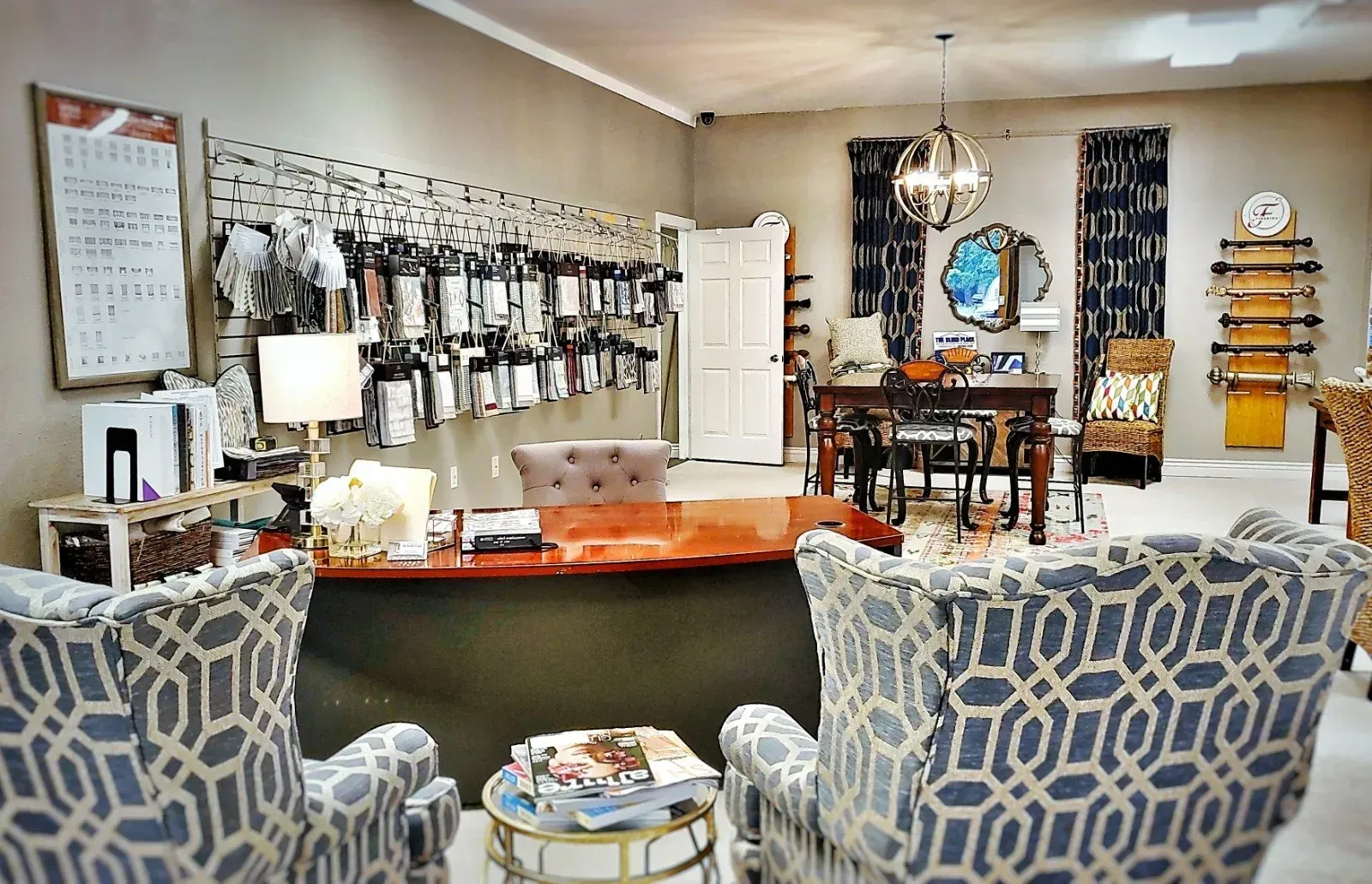 Stylish boutique interior with patterned chairs, front counter, and wall displays of hanging accessories