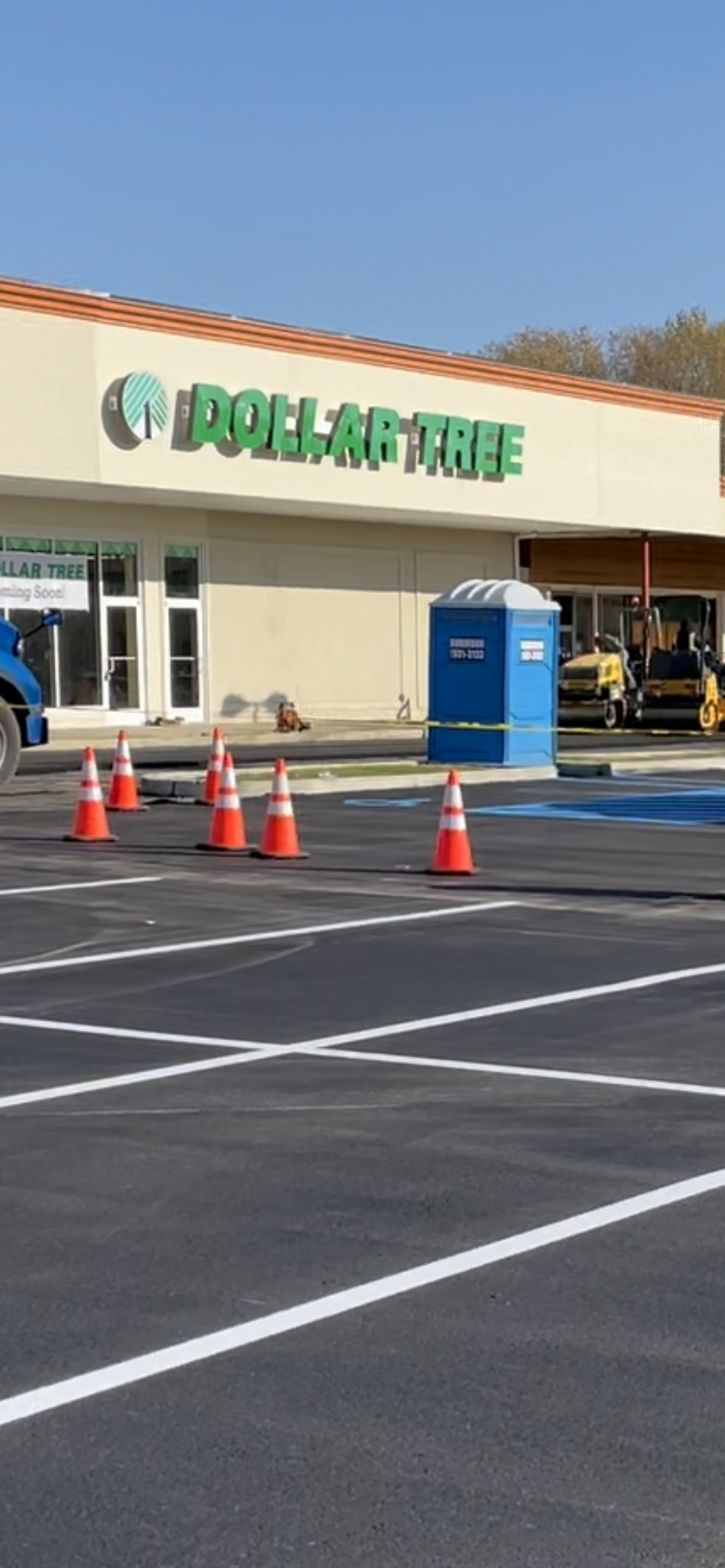 Parking lot in front of a Dollar Tree store