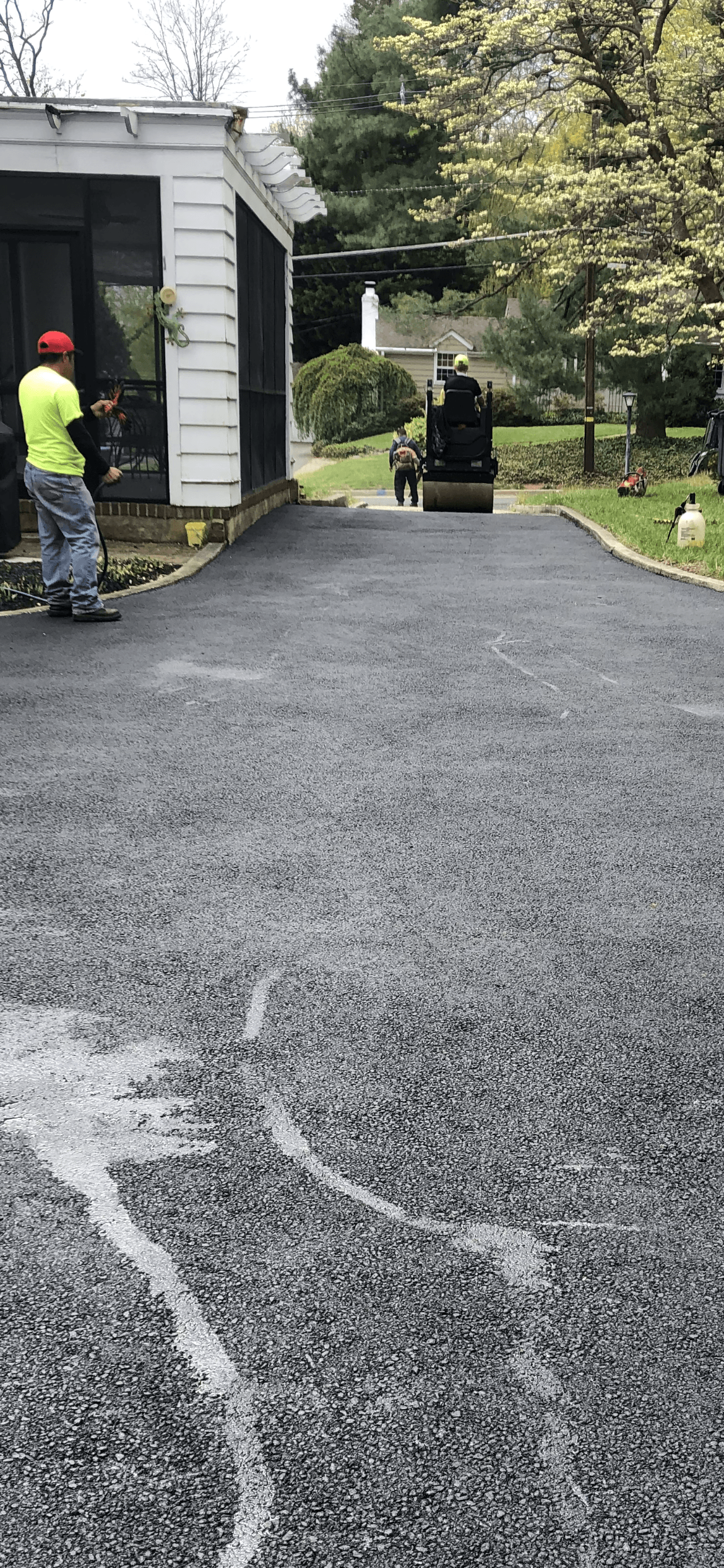 Man working on an asphalt road