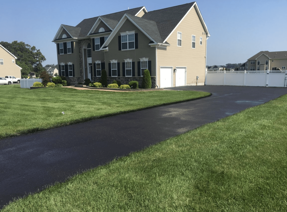 House with a driveway leading to it