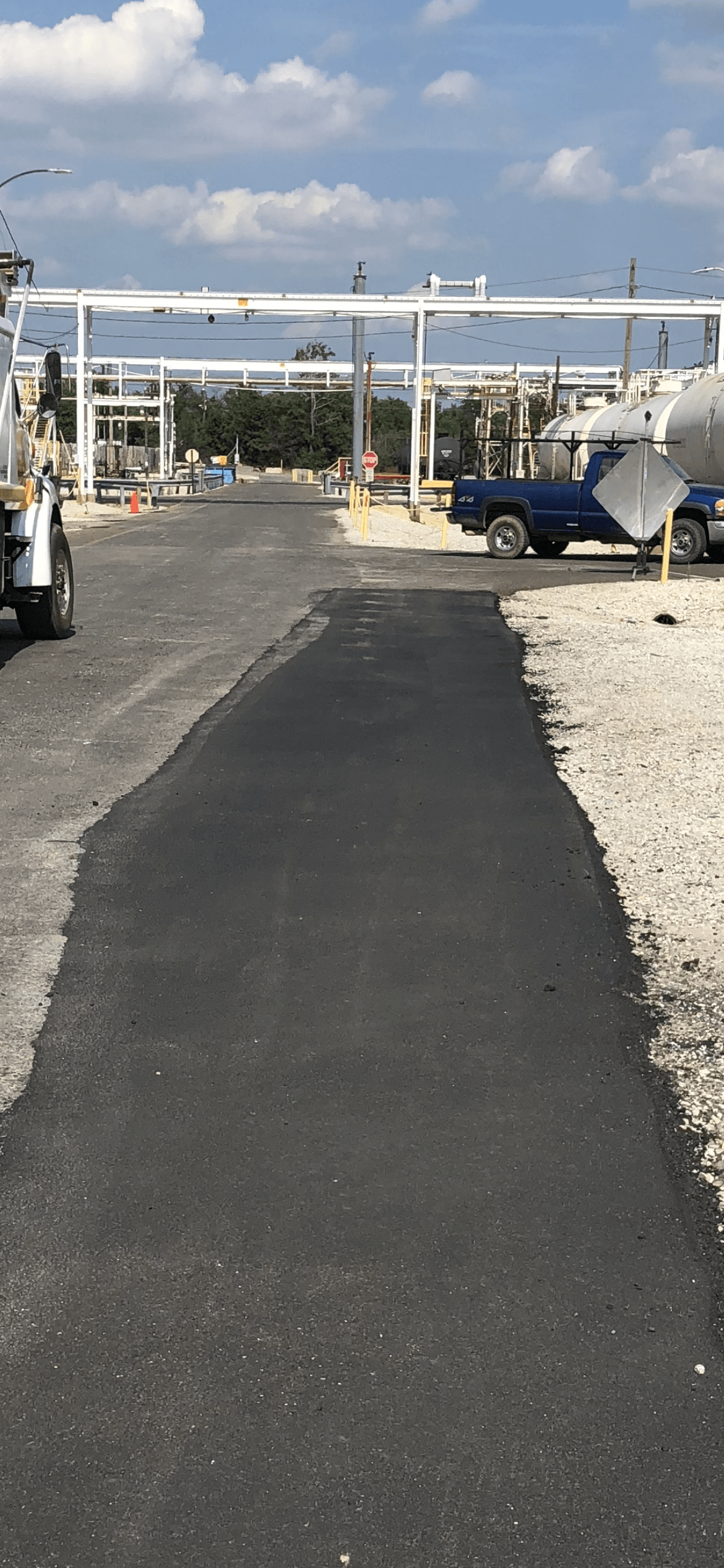 Road sealcoating on a commercial lot