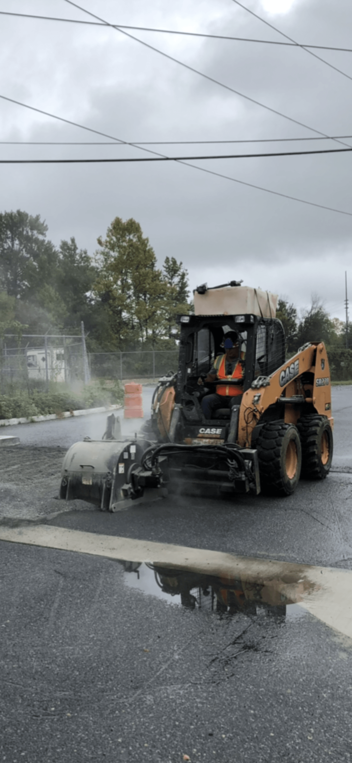 Bulldozer laying asphalt