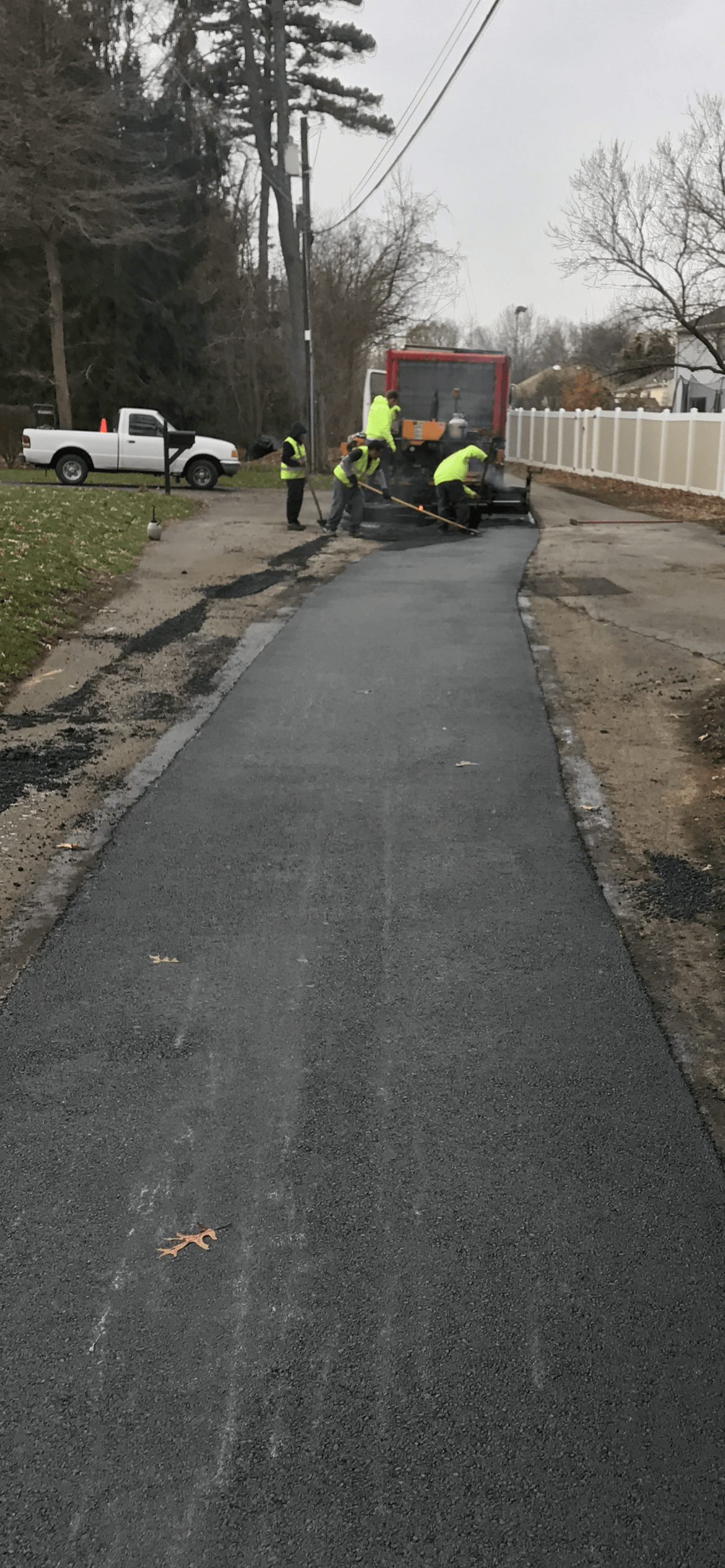 Workers asphalt road construction